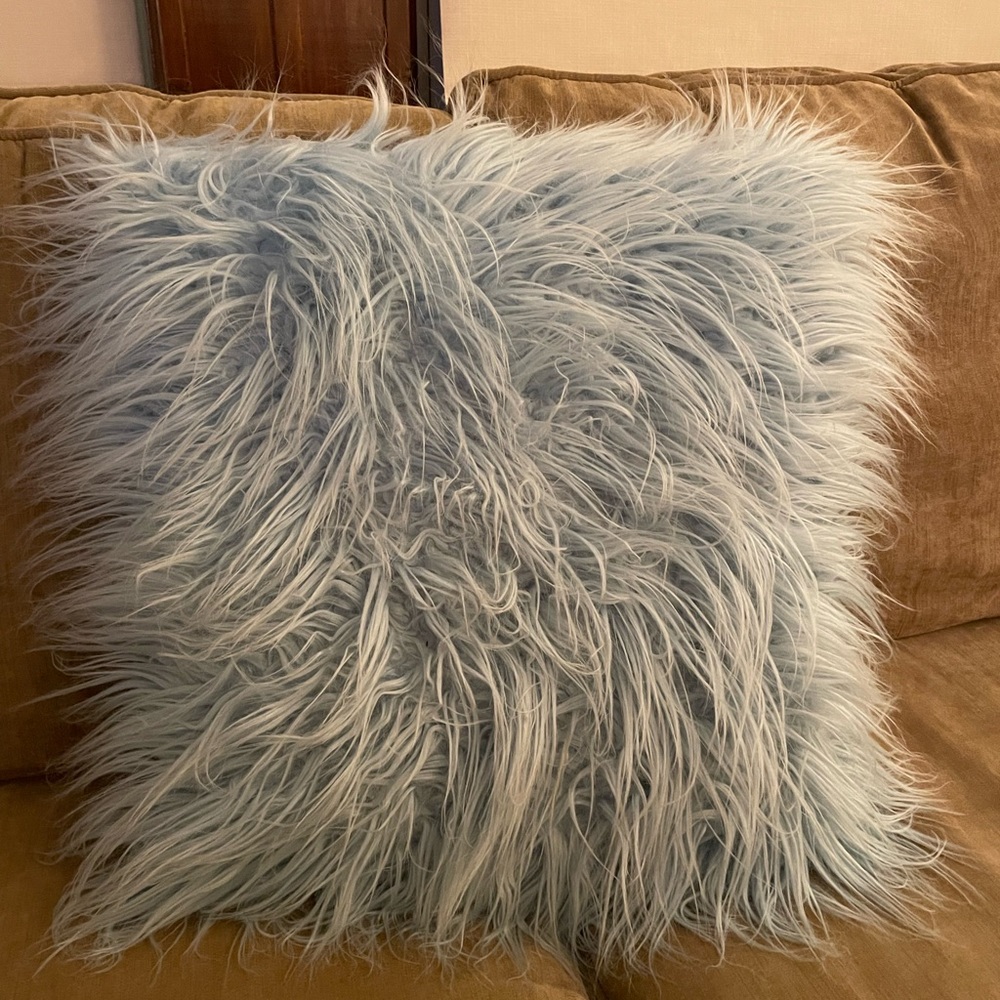 Blue fluffy throw pillow